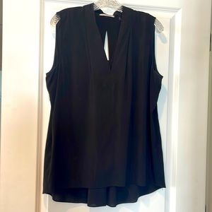 T Tahari stretch swing blouse with small cutout on back